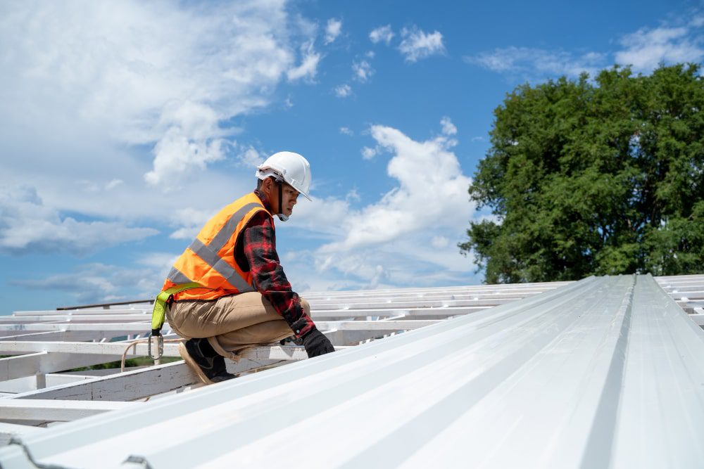 A commercial roofing team performing maintenance on a flat roof in Oklahoma City.